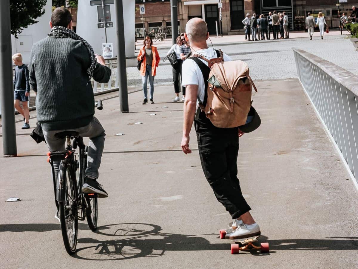 is riding a bike on the sidewalk illegal